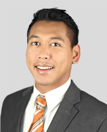 Headshot of Roman Tanjuakio